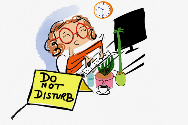 Woman working on computer at home with a big sign 'do not disturb' next to her.