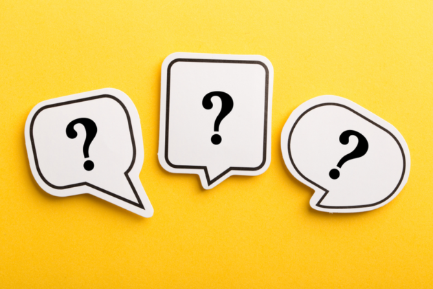 Question mark speech bubble isolated on yellow background.