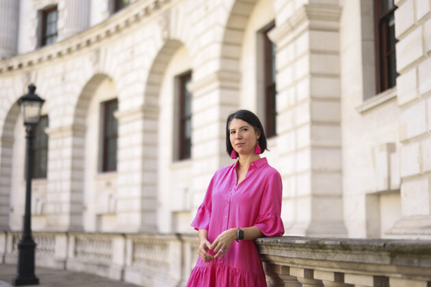 Zara Farrar, Deputy Head of Discipline Digital, standing outside a government building