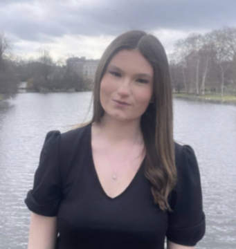 Photo of Sarah Baxendale with a river in the background